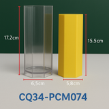 Transparente Kunststoffform CQ34-PCM074 für hohe sechseckige Kerzen neben gelber Stumpenkerze