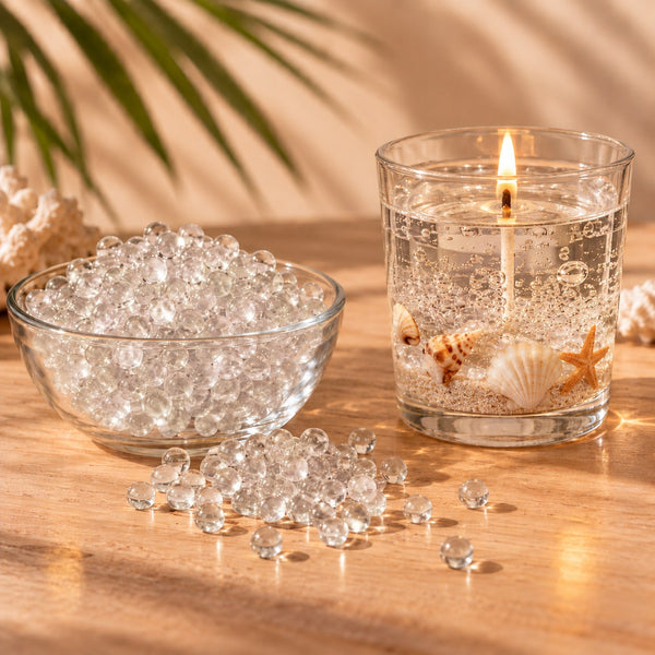 Perle di cera gel trasparente per candele e candela gel accesa con conchiglie e sabbia
