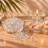 Perle di cera gel trasparente per candele e candela gel accesa con conchiglie e sabbia