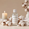 Fragancia para velas Flor de algodón de Naturcera, botella de vidrio con los ingredientes de su aroma