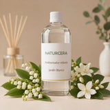 Recarga de ambientador mikado Jardín Blanco de Naturcera, botella de 1 L con los ingredientes de su aroma