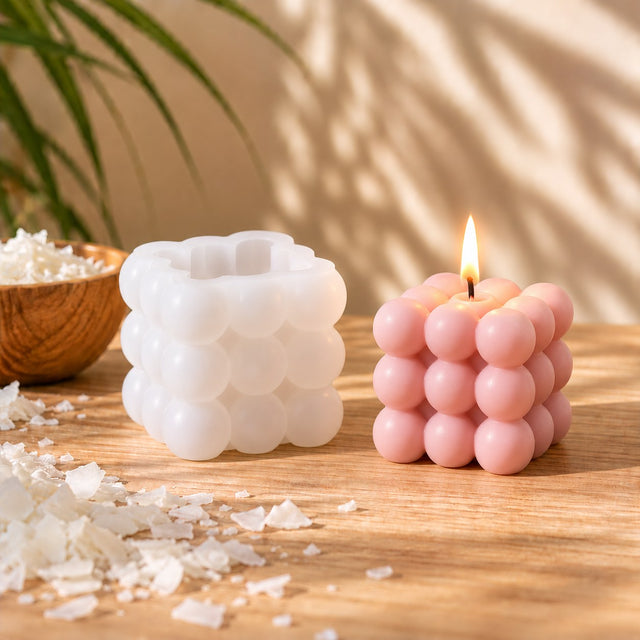 Molde de silicona bubble cube individual y vela de burbujas rosa encendida - Naturcera