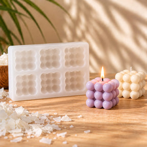 Molde de silicona bubble cube de 6 cavidades con velas de burbujas lila y crema - Naturcera